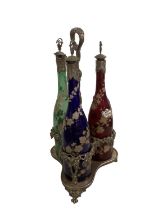 Late C19th Bohemian three bottle decanter set with silver plated grape and vine cast decoration to