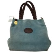 A blue suede Mulberry Handbag with brown leather handles, some fading and wear to the suede