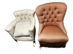 Two upholstered arm chairs: A small French linen upholstered button back on raised legs to
