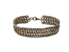 A 9ct yellow and white gold flat belt link bracelet. Approx 17cm. 32g.