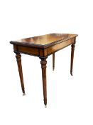 A Gillows style burr maple extending card table, with ebonised string inlay on tapering fluted