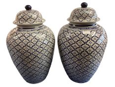 A decorative pair of contemporary blue and white ginger jars and covers, approx 48cmH, pattern white