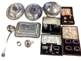 A collection of silver plated wares to include lidded terrine and ladle, boxed items and oval