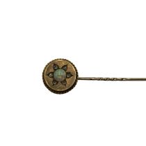 A 15ct gold opal and rose cut diamond tie pin, 3grams