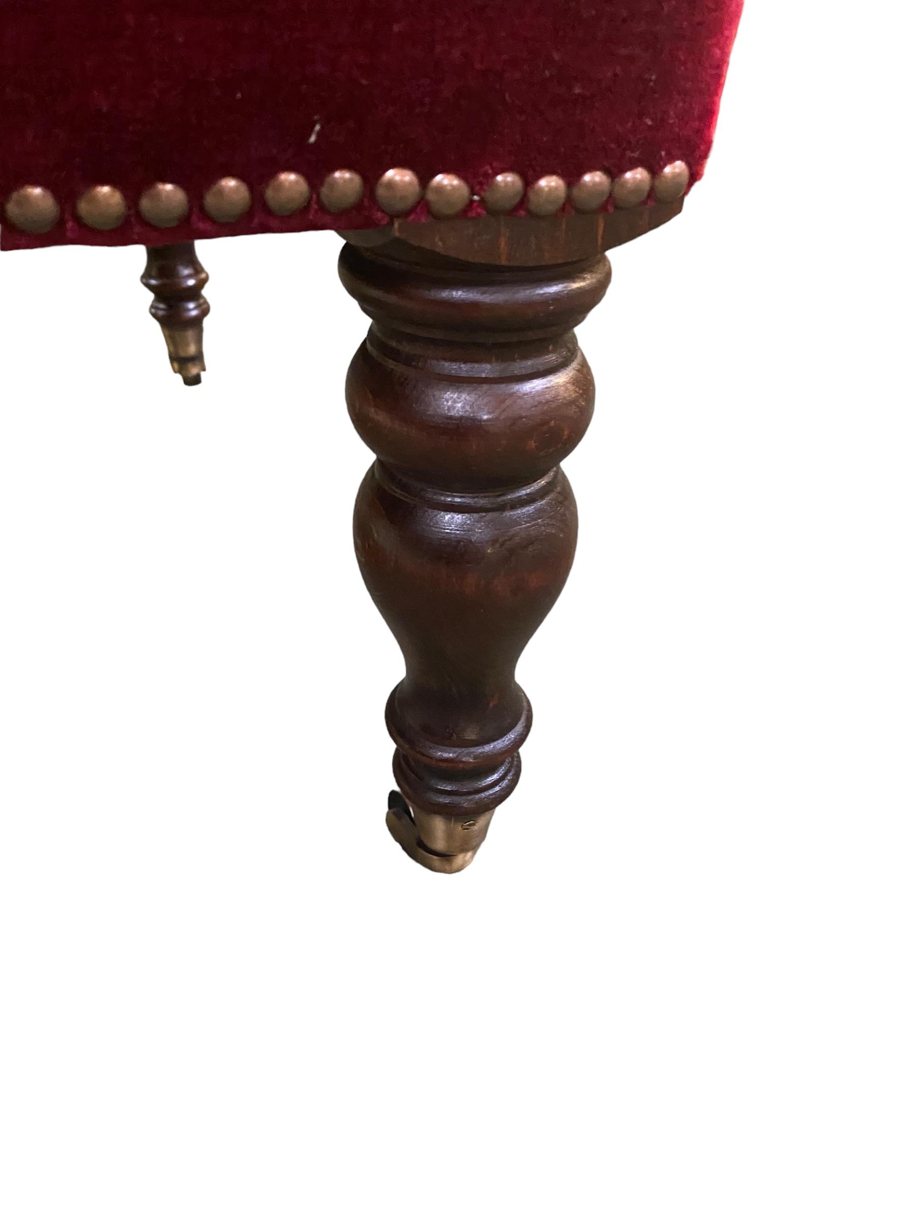Rectangular upholstered stool on mahogany turned legs with brass castors 94 cm W x 64 cm D x 45 cm H - Image 2 of 2