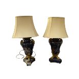 A pair of excellent quality carved hardstone and ormulu mounted table lamps with claw feet on