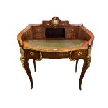 Louise XVI style kingwood and ormulu mounted ladies writing desk with central inset clock on sabre