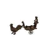 A small silver model of a chariot and cherub, being pulled by a chicken