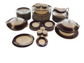 A Royal Worcester dinner service, Monte Carlo, circa 79 items in total. 18 dinner plates, 17