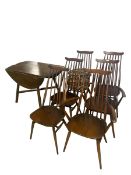 Ercol style set of 6 dark wood spindle back chairs (4 +2) and a matching dark wood fall flap