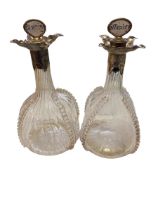 Pair of Victorian silver topped decanters with mother of pearl set stoppers brandy and whisky Edward