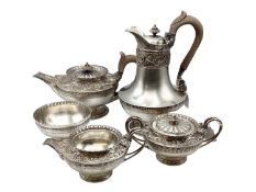 A sterling silver five piece tea set of heavy gauge with cast acanthus leaf decoration by Amos