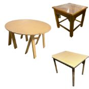 Modern circular table with two tresle base, a rectangular table, and a small 1930s Heals oak side