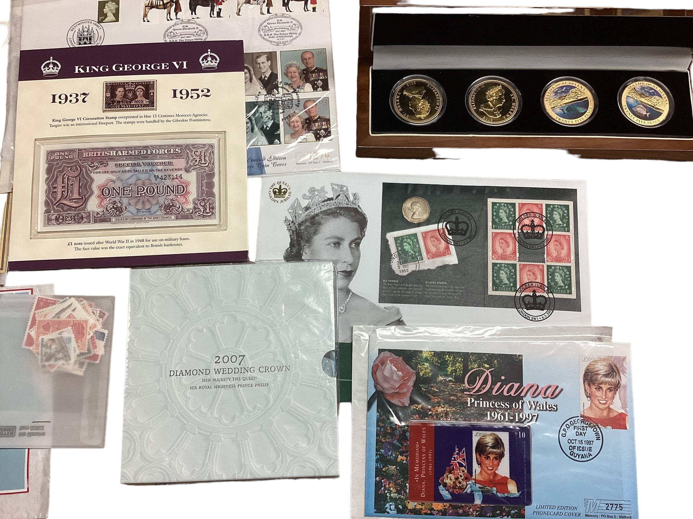 A collection of 20th century commemorative and collectible coins and stamps and bank notes - Image 9 of 21