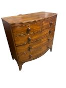 A Victorian mahogany bow front chest of 2 short and 3 long drawers, with some wear, as