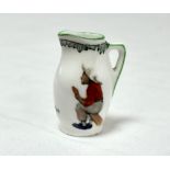 ‘Next Man In’. A Royal Doulton Black Boy miniature jug, entitled ‘Next man in’ printed with a boy