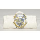 Cricket bag. Small crested china cricket bag with colour emblem for ‘Bournemouth’. Approx 3.25”