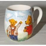 Cricket mug. A small hand painted china mug by Joan Allen featuring two teddy bears, one holding a