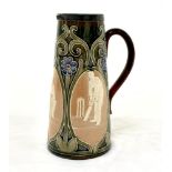 Doulton Lambeth tall tapering stoneware jug with three moulded relief vignettes of cricketers, a