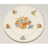 Childs sporting plate. Ceramic plate with centre piece of three dogs playing cricket, with borders