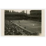 ‘Wimbledon Number One Court’ circa 1937. Original mono action real photograph postcard with a men’