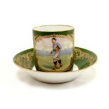 Sevres football cup and saucer. A beautifully made and decorated green & gold porcelain tea cup