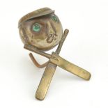 Cricket pin cushion. Edwardian brass metal pin cushion, the cushion on the head of a cricketer