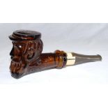 W.G. Grace. Brown glass after shave bottle by Avon in the shape of a pipe with head of Grace as