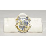 Cricket bags. Three small crested china cricket bags with colour emblems for ‘Bournemouth’, ‘Great