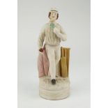 Continental cricket figure. Early bisque cricketing figure of an early bowler on naturalistic