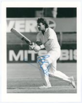 Ian Botham. Sheffield Shield 1987/88. Original mono press photograph of Botham in batting action for