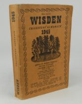 Wisden Cricketers’ Almanack 1945. 82nd edition. Original limp cloth covers. Only 6500 paper copies