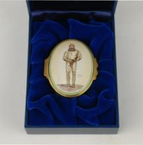 ‘W.G. Grace’. Halcyon Days oval enamelled pill box. The lid decorated with full length figure of