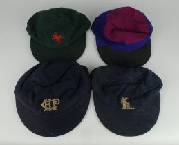 Cricket caps worn by Robin Marlar during his playing career. Four caps, one a Cricket Society cap,