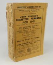 Wisden Cricketers’ Almanack 1921. 58th edition. Original paper wrappers. Breaking to spine block,