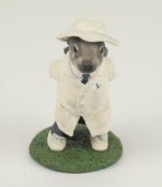 ‘The Rabbit Umpire’. A handmade and painted figure of a rabbit in umpires attire stood with his