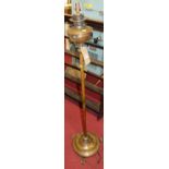 An early 20th century copper and brass standard lamp, converted from a paraffin lamp, height 140cm