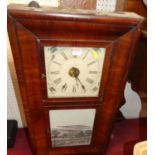 An early 20th century American mahogany droptrunk wall clock, 76.5 x 42.5cm