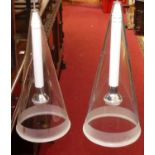 A set of three contemporary conical clear and frosted glass ceiling pendants, in boxes and with