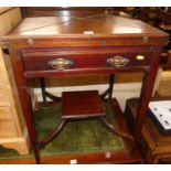 An Edwardian mahogany envelope card table, having single frieze drawer, raised platform undertier,