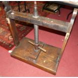 A 19th century elm and fruitwood book press, width 74.5cm