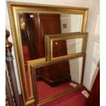 Three various contemporary gilt framed bevelled rectangular wall mirrors, the largest 140 x 116cm