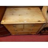 A Victorian pine round cornered chest of two short over two long drawers, on turned supports,