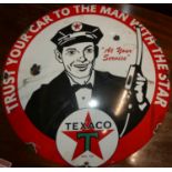 An enamel convex advertising sign for Texaco, dia.30cm