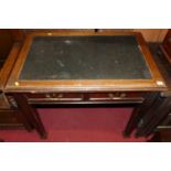 An early 20th century mahogany and rexine inset two-drawer writing table, width 91.5cm