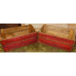 A pair of contemporary close nailed slatted pine drinks carrying boxes