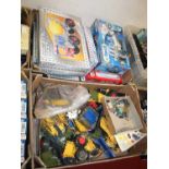 Two trays containing a collection of mixed Meccano to include metal kits, concrete mixer and others