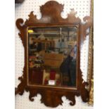 An early 20th century mahogany fret-cut rectangular wall mirror, 60 x 42cm