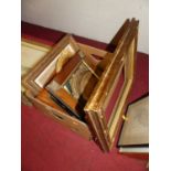 Assorted wooden and gilt composition picture frames to include oval examples