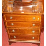 A mahogany and satinwood inlaid chest of four long graduated drawers, width 61cm